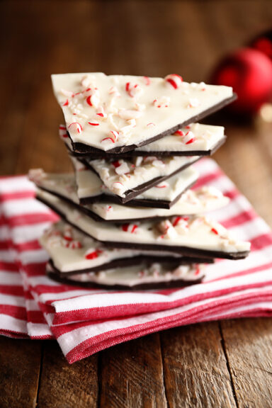 Peppermint bark pieces on red and white towel