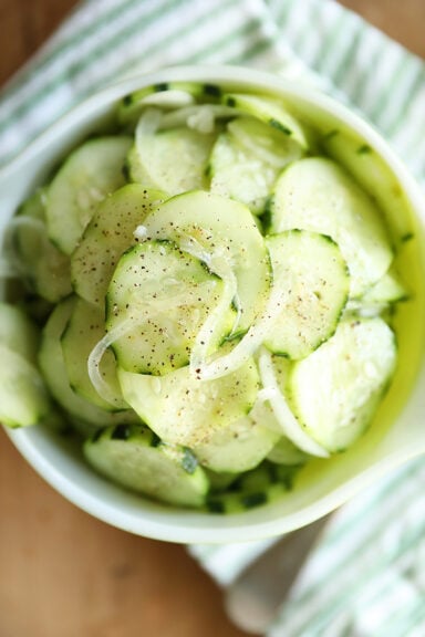 Overhead shot of Simple Cucumber and Onion Salad in a bowl.