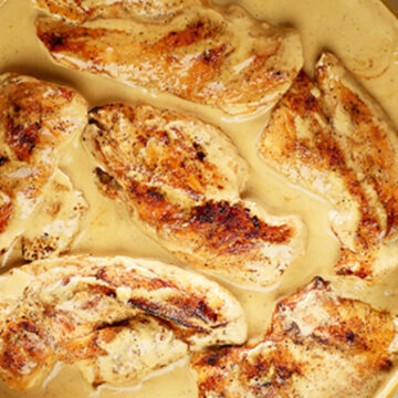 Seared chicken breasts in cream cheese pan sauce