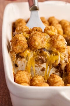 Scoop of Cheesy Tater Tot Casserole.