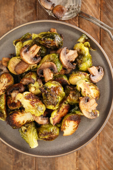 Roasted Brussels Sprouts with Mushrooms on a plate