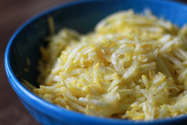 Grated squash in a bowl.