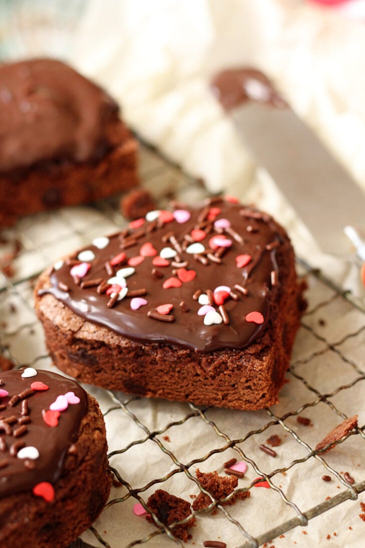 Heart-shaped brownies with chocolate ganache frosting.