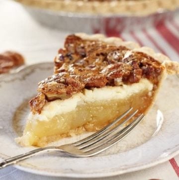 The delicious cream cheese layer in this Cream Cheese Pecan Pie really puts it over the top!