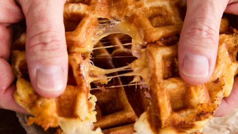 Tearing apart a Ham, Egg, and Cheese Biscuit Wafflewich.