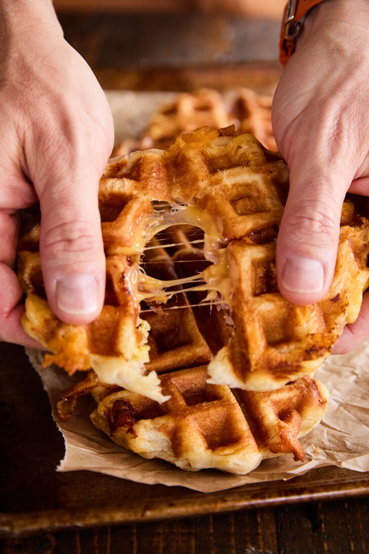 Tearing apart a Ham, Egg, and Cheese Biscuit Wafflewich.
