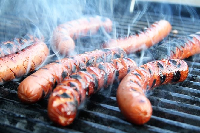 This fun and easy tip will ads tons of flavor to your hot dogs this summer!