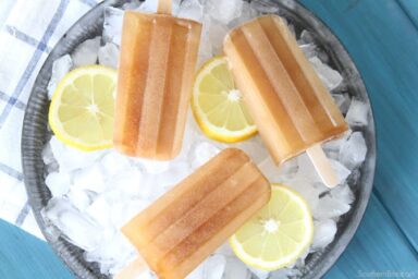 Beat the oppressive summer heat with these amazingly easy Sweet Tea Ice Pops!