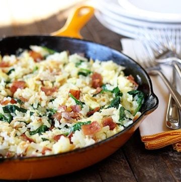 Hash browns, eggs, spinach, and chicken bacon combine to make this lightened-up version of a breakfast classic!