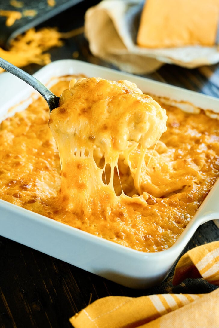 Cheese pull of Classic Baked Macaroni and Cheese.