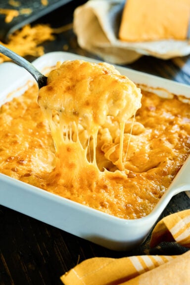 Cheese pull of Classic Baked Macaroni and Cheese.