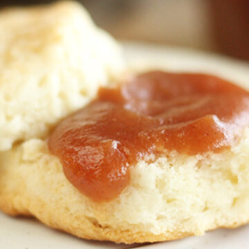 Slow Cooker Apple Butter on a biscuit