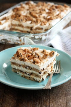 Slice of Milk and Cookies Icebox cake on green dish