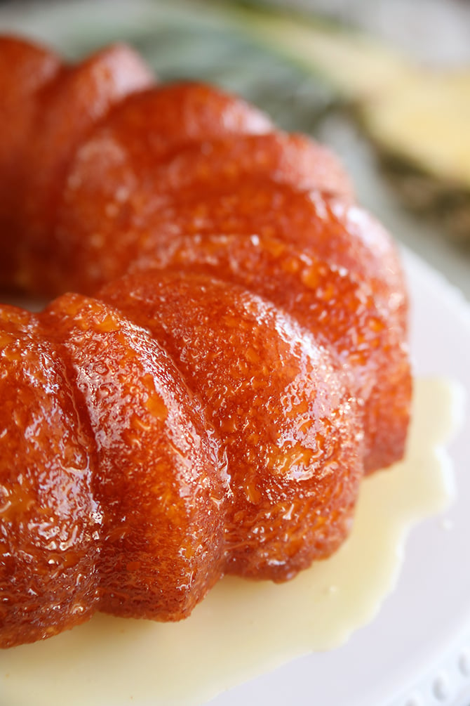 This recipe for Pineapple Juice Cake starts with a cake mix, adds pineapple juice in the batter, and then the cake is bathed in a butter-pineapple juice glaze. It's so easy, but super delicious! 