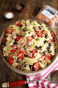 Kitchen Sink Pasta Salad with package of sausage in the backgroud