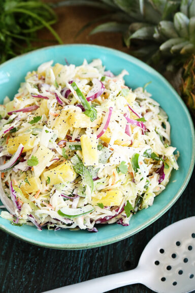 Pineapple slaw in serving bowl closer photo