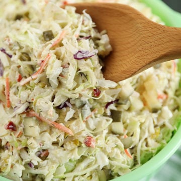 Dill Pickle Coleslaw with wooden spoon
