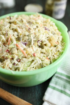 Dill Pickle Coleslaw in a green bowl