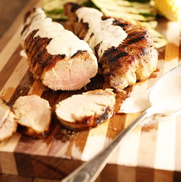 Grilled Pork tenderloin with white bbq sauce over it