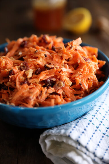 Carrot Cranberry Salad in a blue bowl