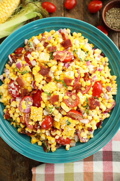 Sweet Corn Salad with Bacon in a Teal Bowl.