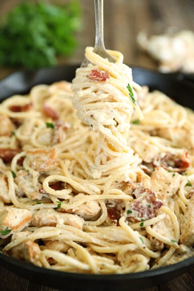 Cream Cheese Bacon Chicken Pasta on a fork