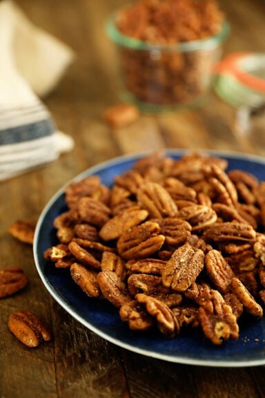 Butter Toasted Pumpkin Spice Pecans on a blue plate