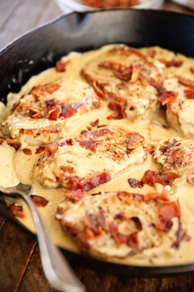 Pork Chops with Cream Bacon Pan Sauce in skillet