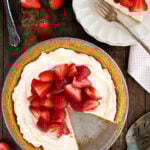 Overhead view of Strawberry Cream Cheese Pie with one piece missing.