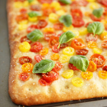 Shortcut Tomato Focaccia on a sheet pan.