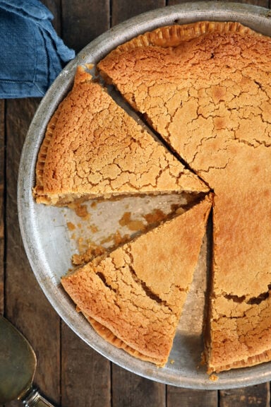 overhead view of Peanut Butter Chess Pie cut into slices.