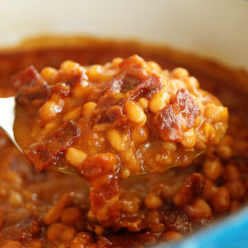 Spoon Full of Bacon Brown Sugar Baked Beans.