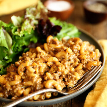 Homemade Hamburger Helper on a plate with a fork.