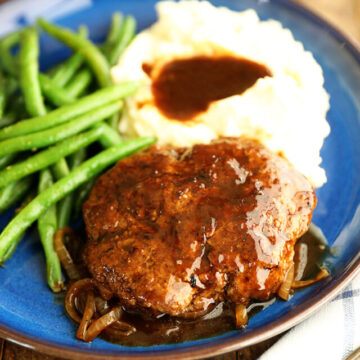 Salisbury Steak on a Plate With Mashed Potatoes.