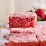 Slice of Strawberry Sheet Cake on server.