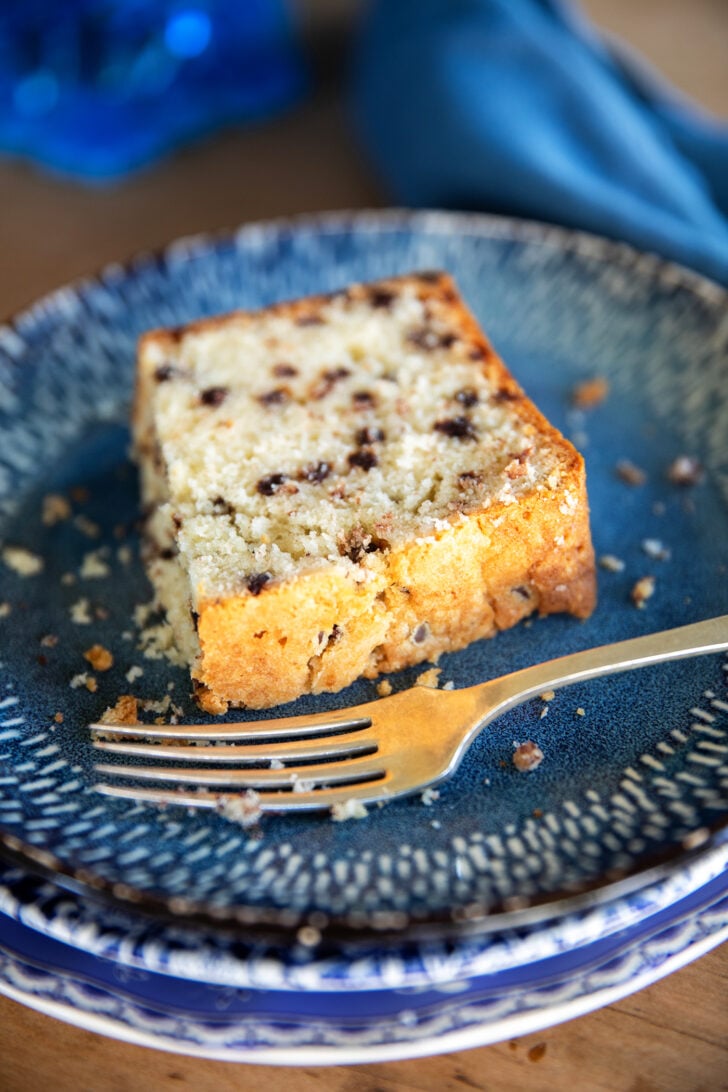 Slice of Chocolate Chip Pound Cake on a blue plate.