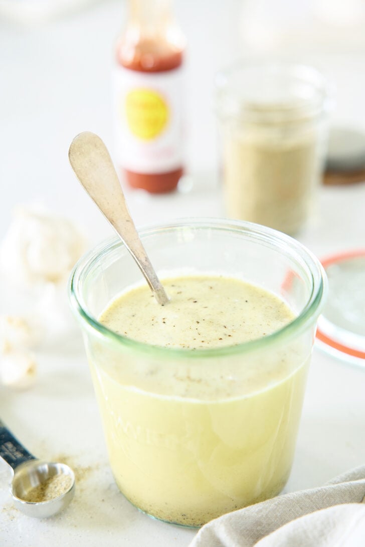 A jar with buttery turkey marinade.