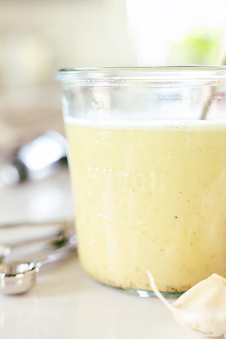 A jar filled with turkey injection marinade.