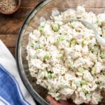 Chicken salad in a clear bowl.