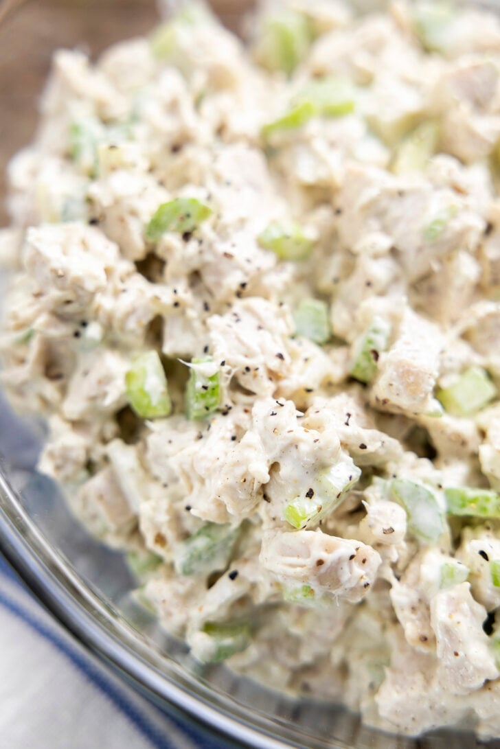 big-batch chicken salad in a clear bowl.