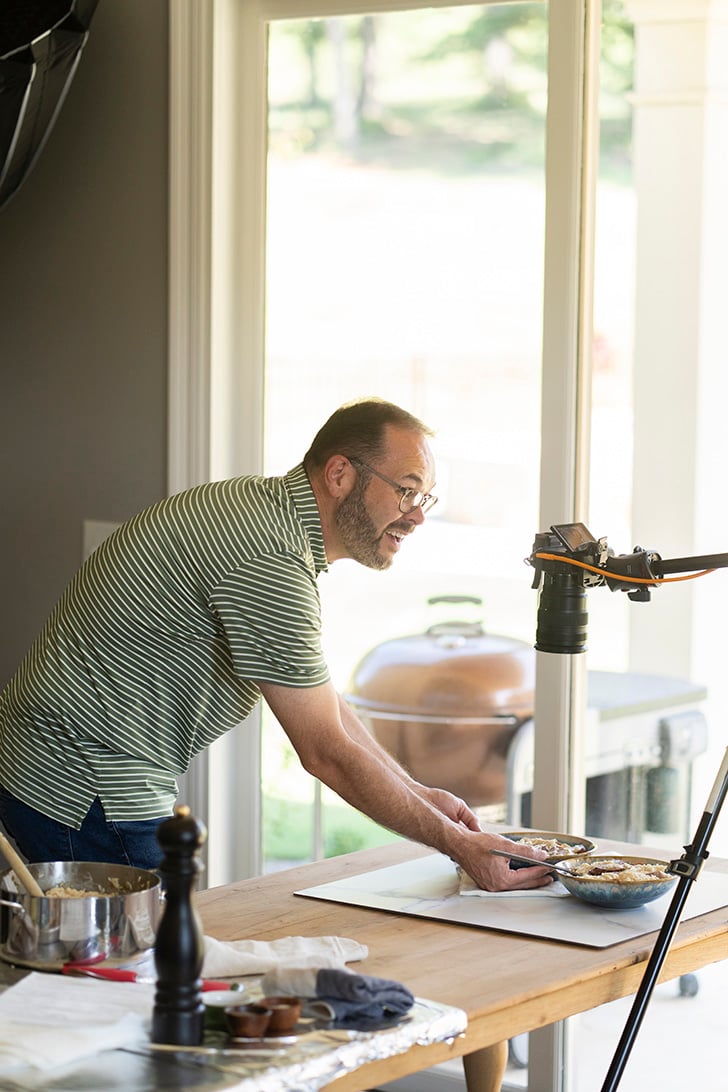 Stacey holding bowls for photo.