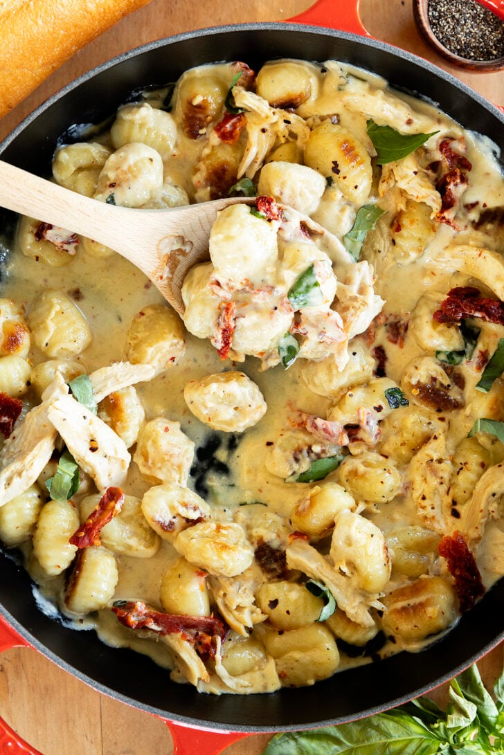 Close-up of Marry Me Chicken Gnocchi with a spoon in it.